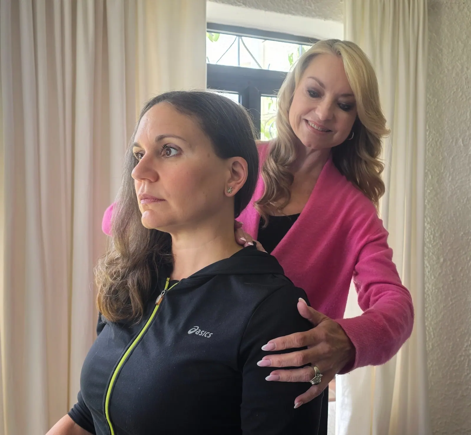 Dr. Tracey Clark performing posture assessment